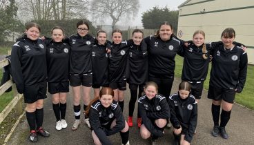 Northallerton Girls Football team in their new black training tops.