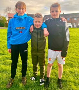 Jake, Lucas and Preston outside their homes in Brompton.